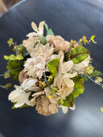 Burlap florals in cracked ceramic vase