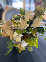 Burlap florals in cracked ceramic vase