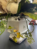 Burlap florals in cracked ceramic vase