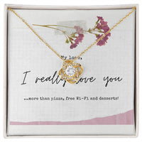 Love Knot Necklace (White or Yellow Gold)